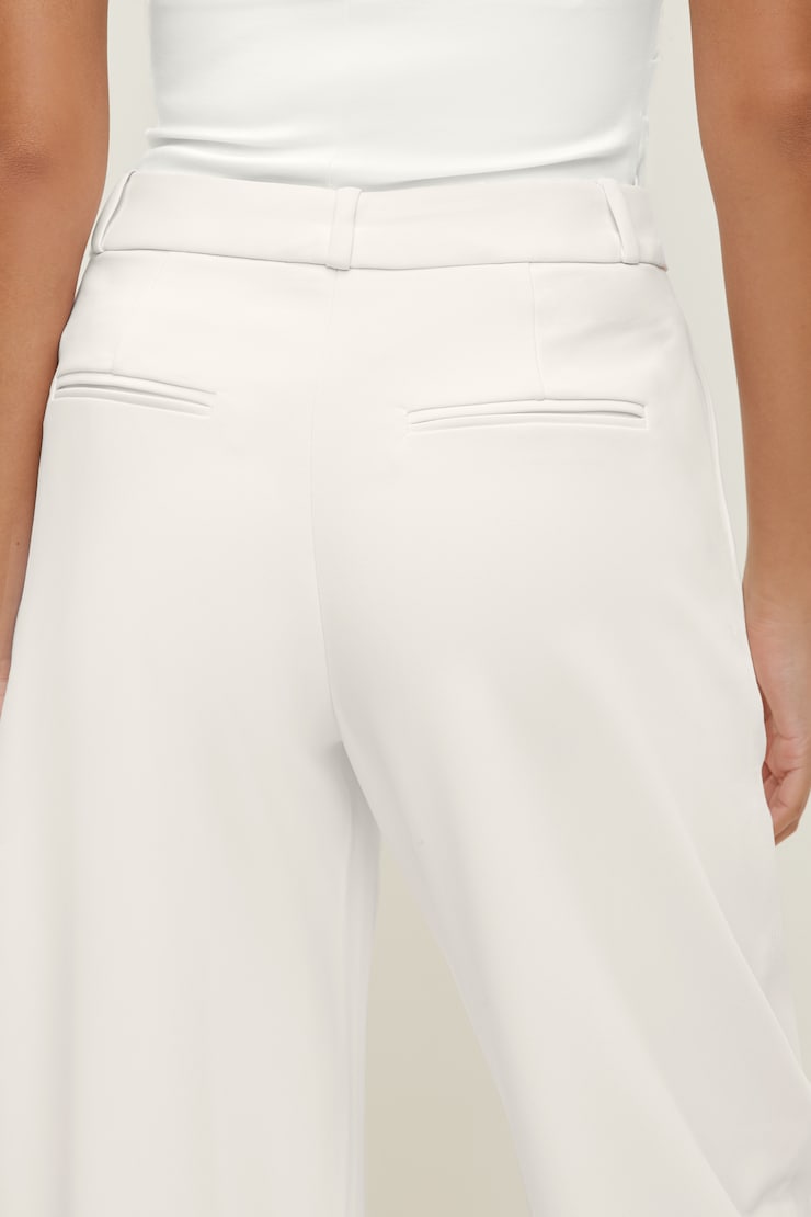 Pantalon à jambe ballon et taille mi-haute