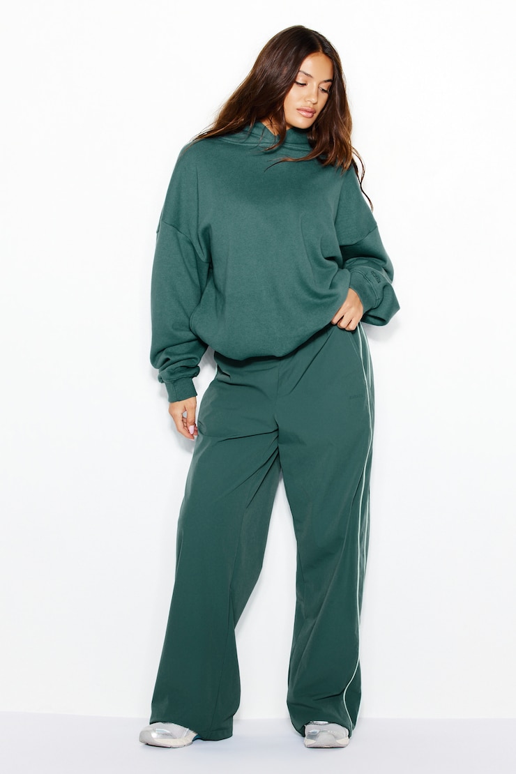 Haut à capuchon en tissu UltraFleece, Tentation sarcelle avec art Garage, large