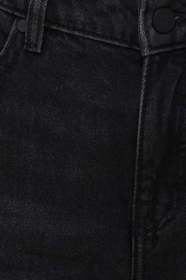 Jean Mika à taille mi-haute et jambe droite décontractée