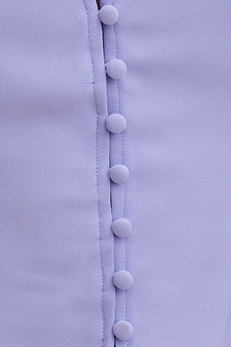 Blouse à manches volants