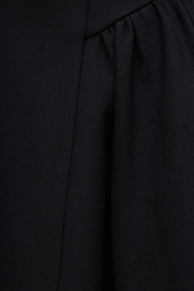 Minirobe évasée en point de Rome à col plongeant