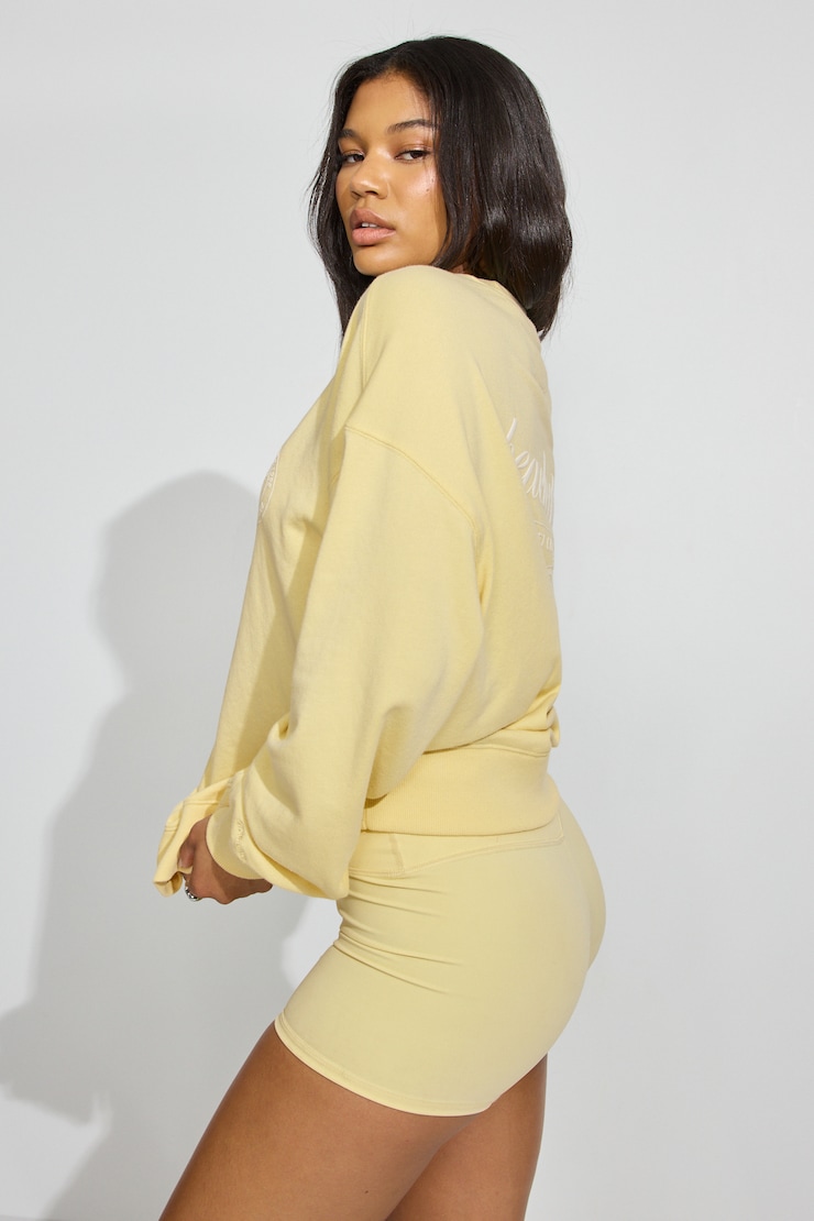 Sweatshirt ample à col rond en SoftTerry, Fleur d’anis jaune avec art « Beach Club », large