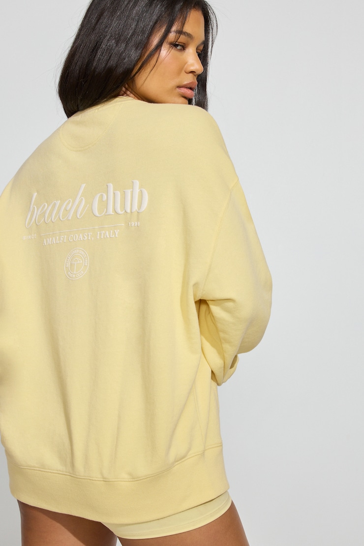 Sweatshirt ample à col rond en SoftTerry, Fleur d’anis jaune avec art « Beach Club », large