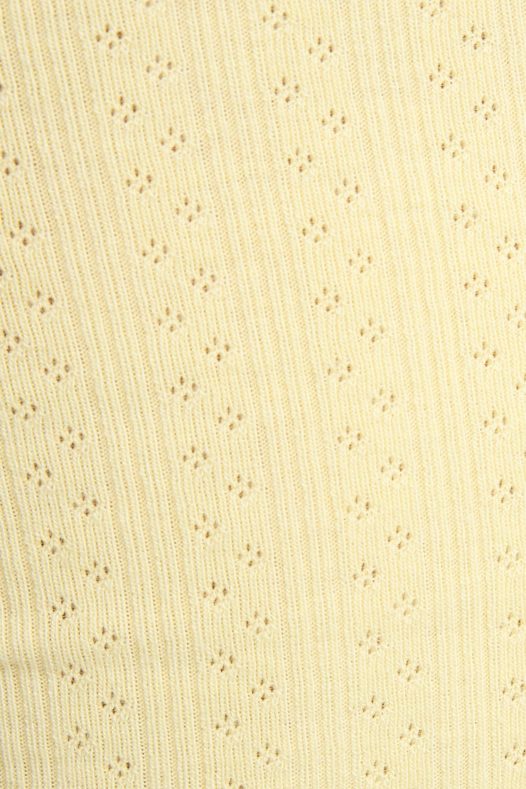 Petit short en pointelle à bordure ondulée