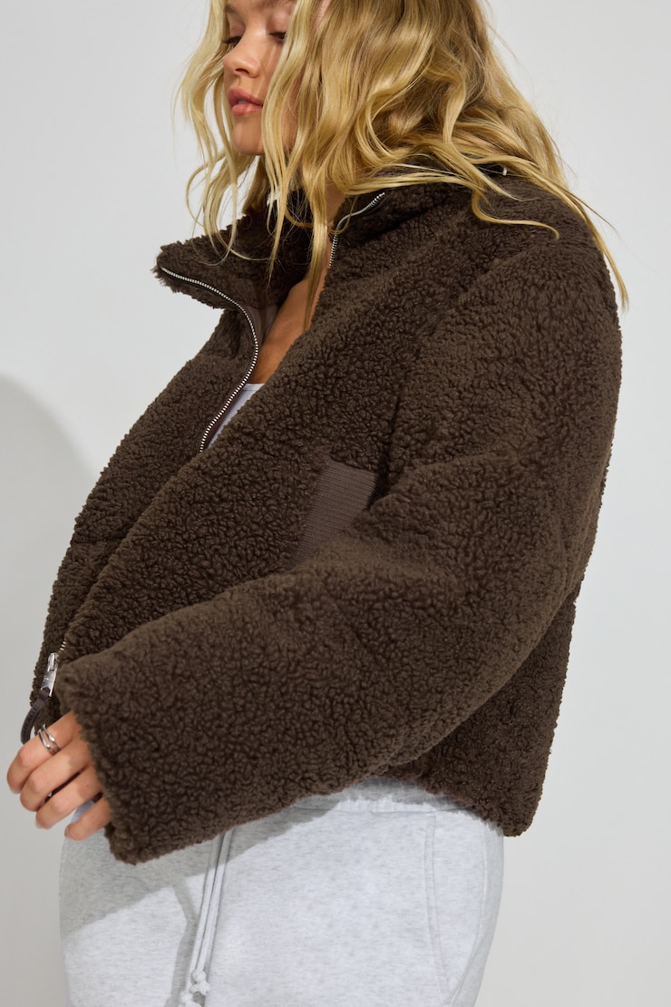 Manteau matelassé en sherpa