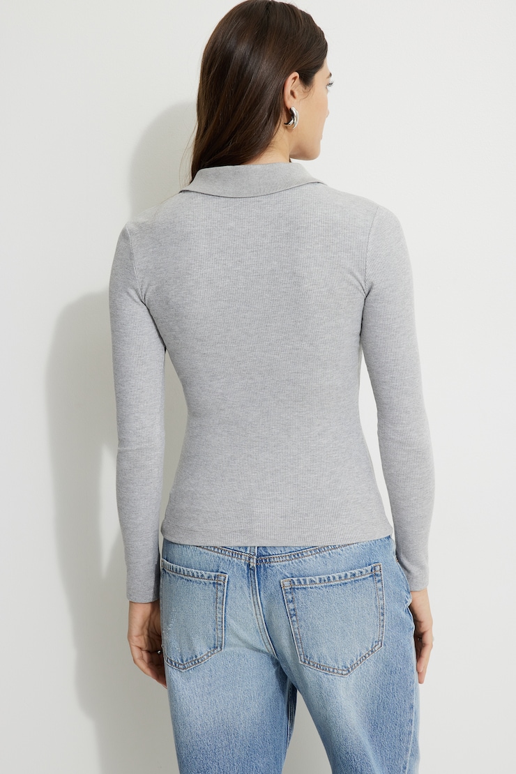 Haut polo côtelé à manches longues