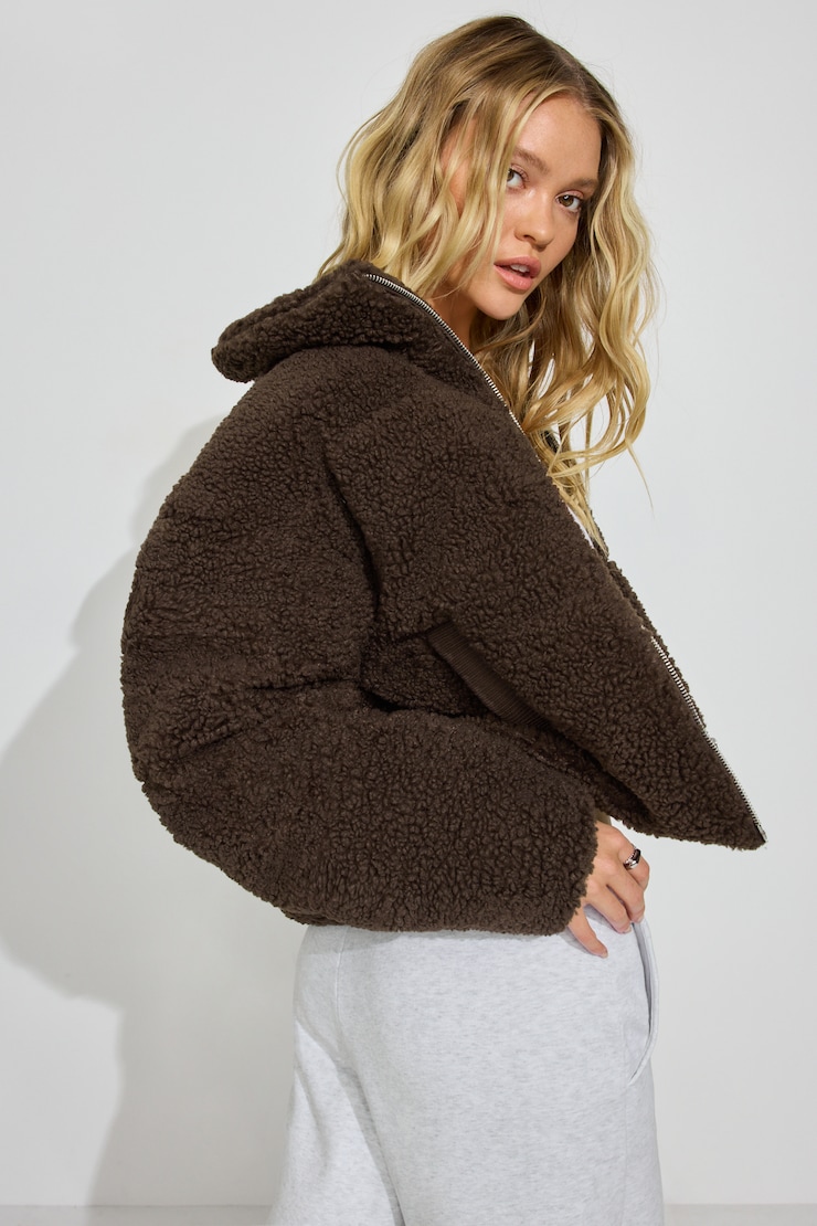 Manteau matelassé en sherpa