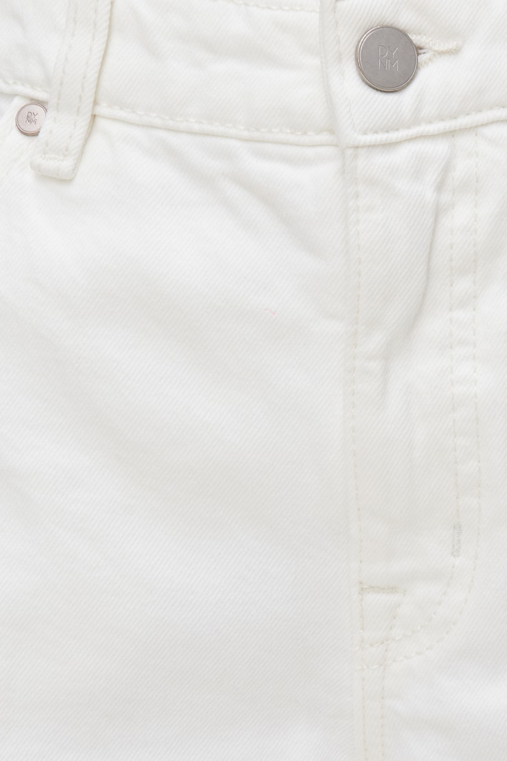 Jean Mika à taille mi-haute et jambe droite décontractée