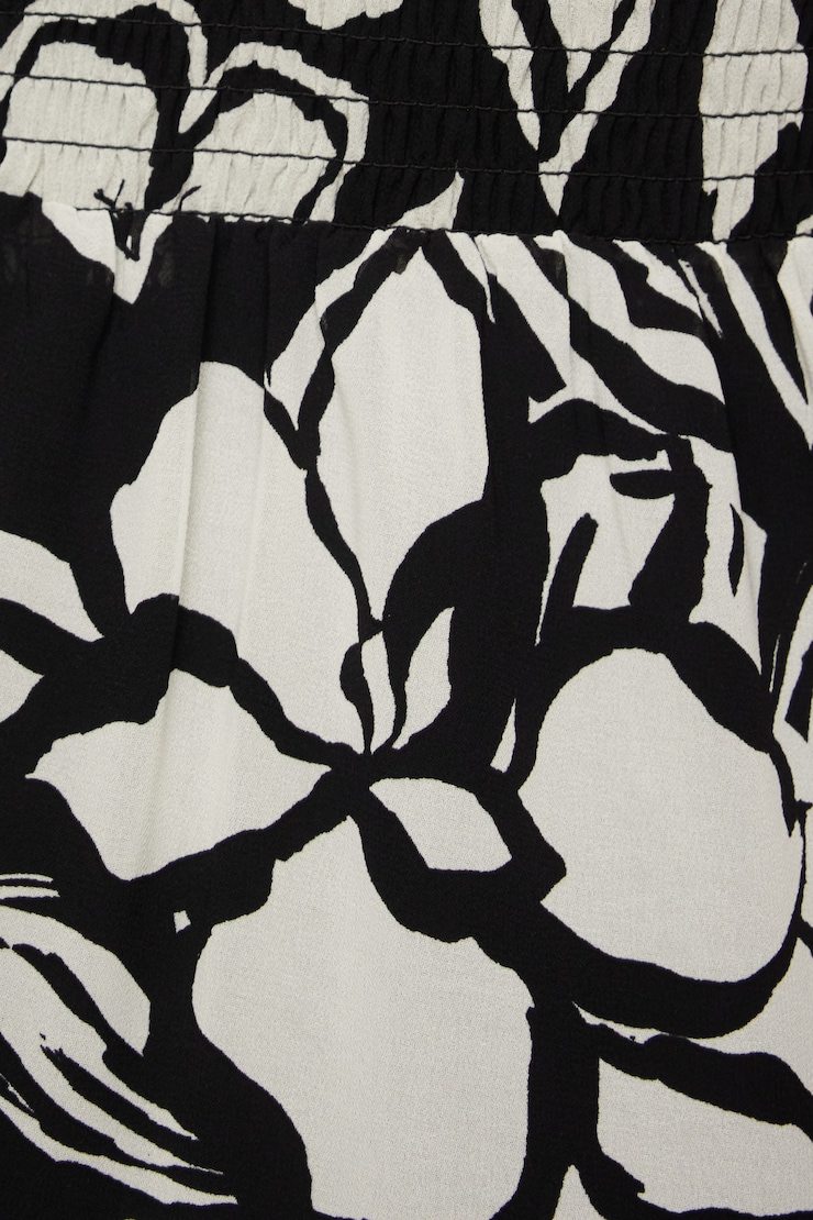 Minirobe évasée Eliana Tan et fleuri noir large
